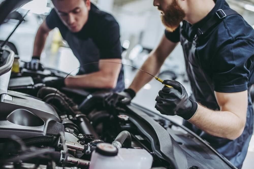 Technicians Working on Car