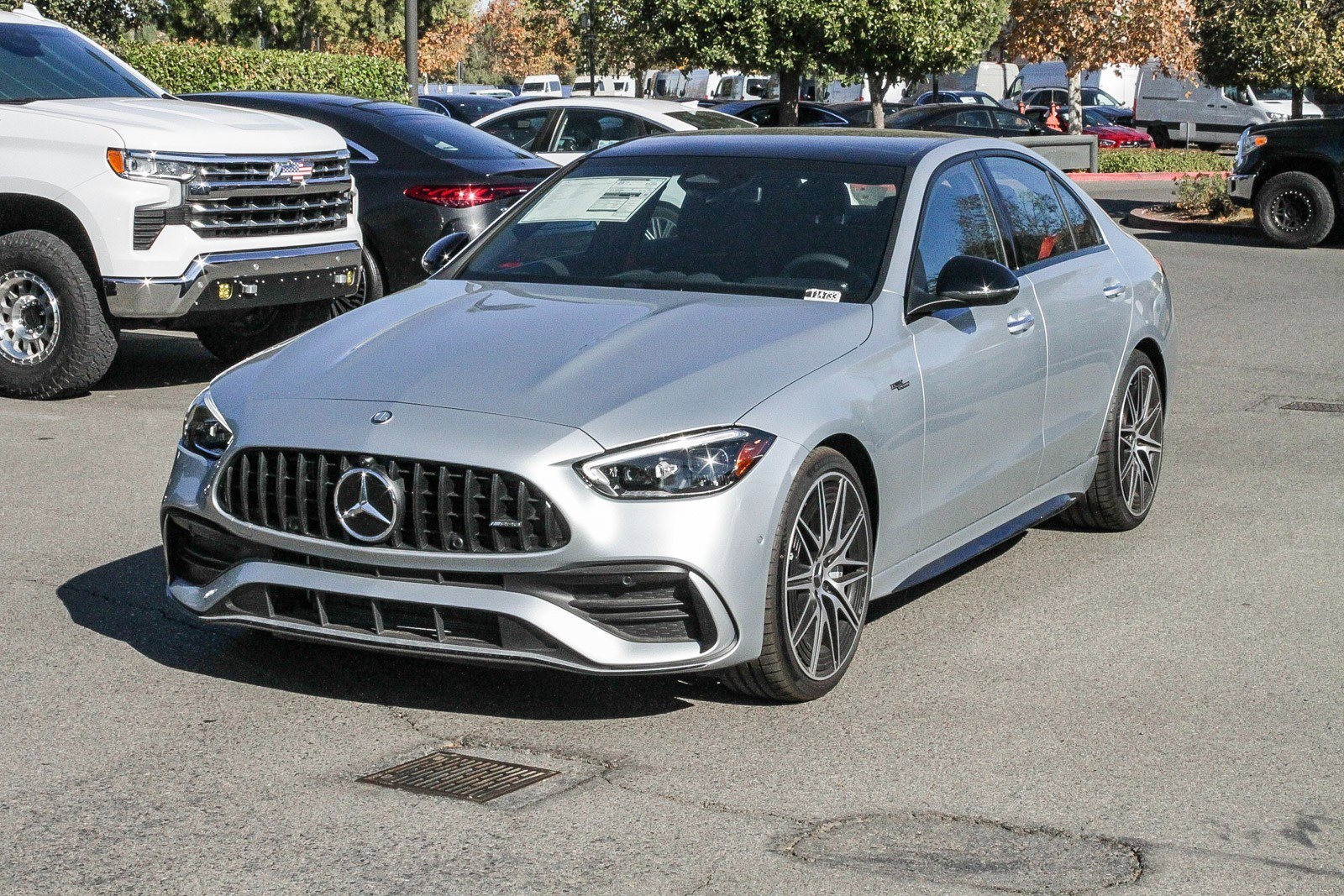 grey 2024 Mercedes C-class sedan parked at the Mercedes-Benz of Temecula dealership in Temecula, CA