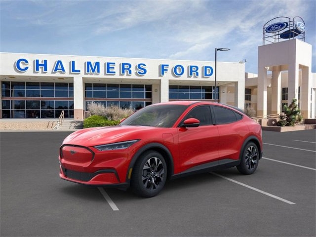 red 2024 Ford Mustang Mach-e parked at the Chalmers Ford dealership in Albuquerque, NM