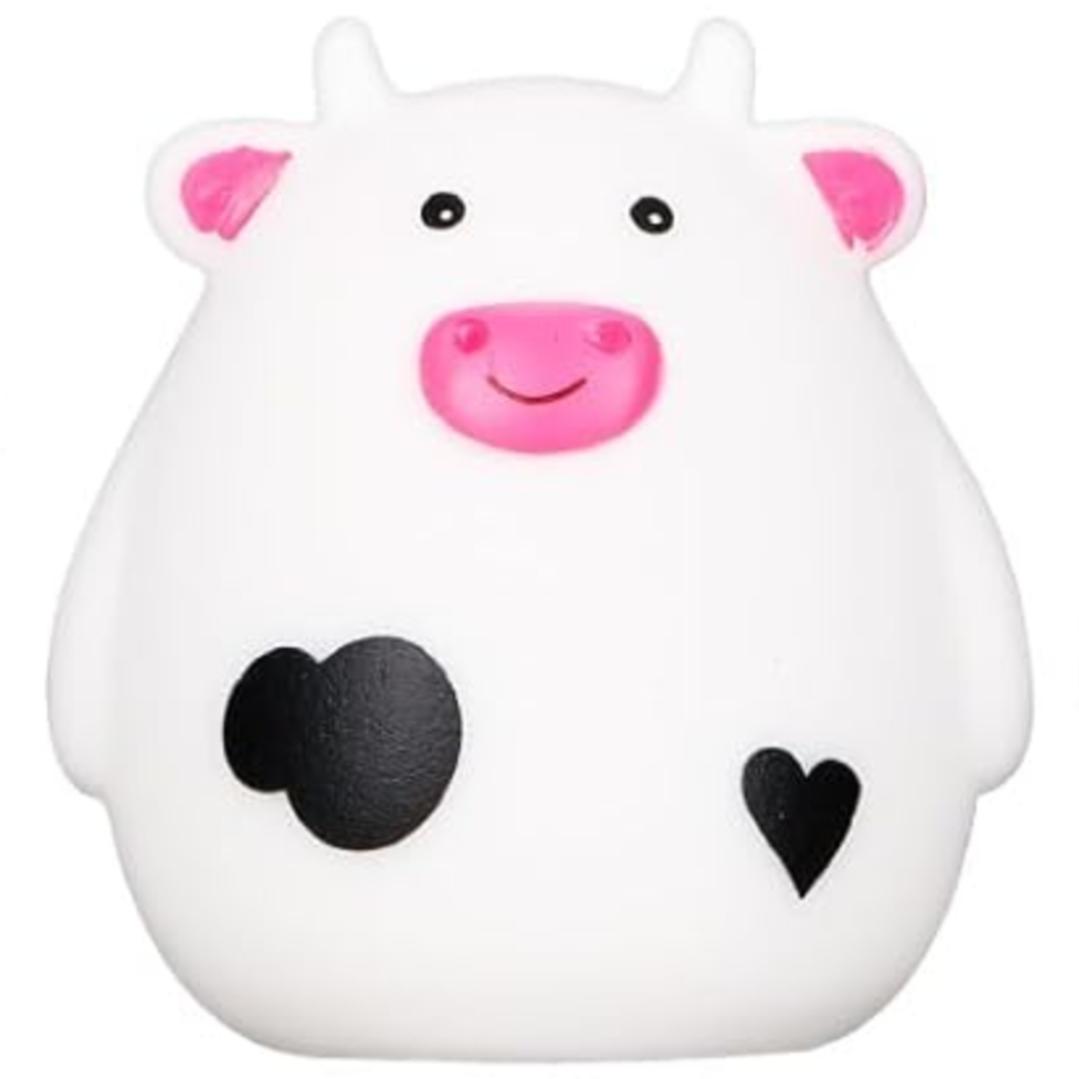 Mini cow figurine on a Subaru dashboard