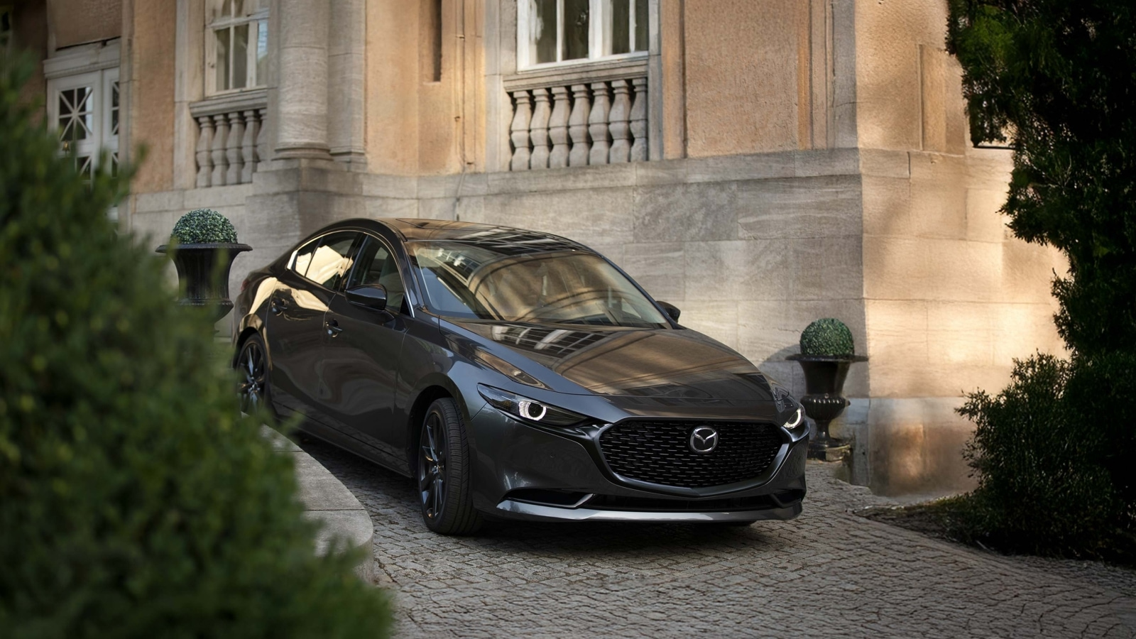 2026 Mazda3 Sedan parked on incline