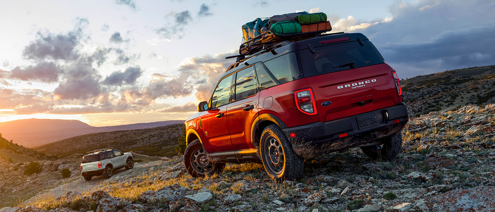 New Ford Bronco Sport SUVs off-roading on rocky terrain