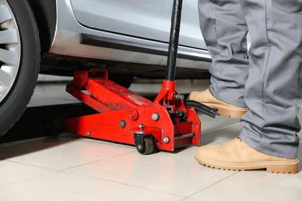 car jack under car