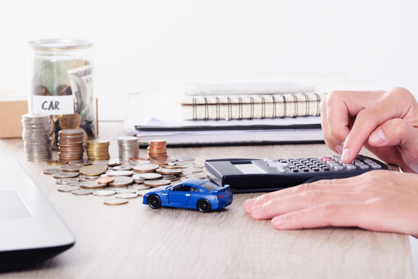 car calculator and coins