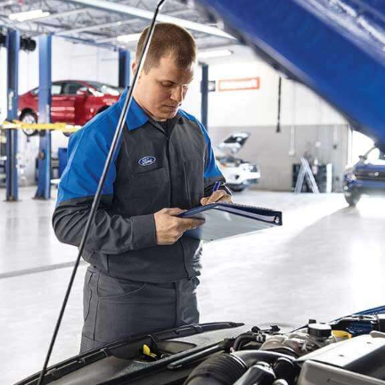 Technicians Working on Ford