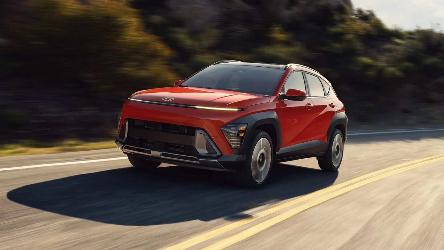 Red 2024 Hyundai KONA in the street