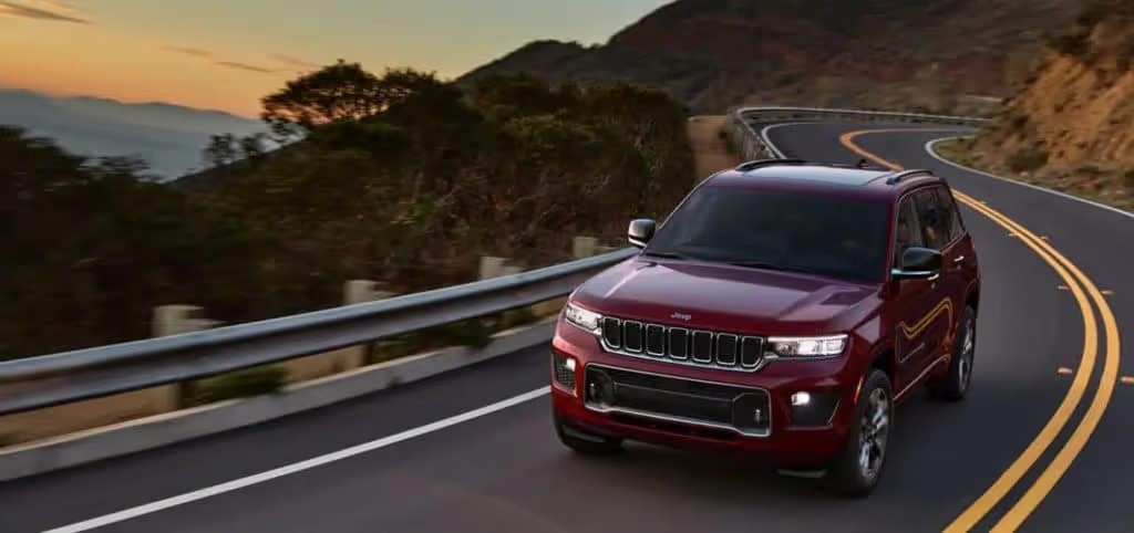 2022 jeep grand cherokee driving on a mountain pass