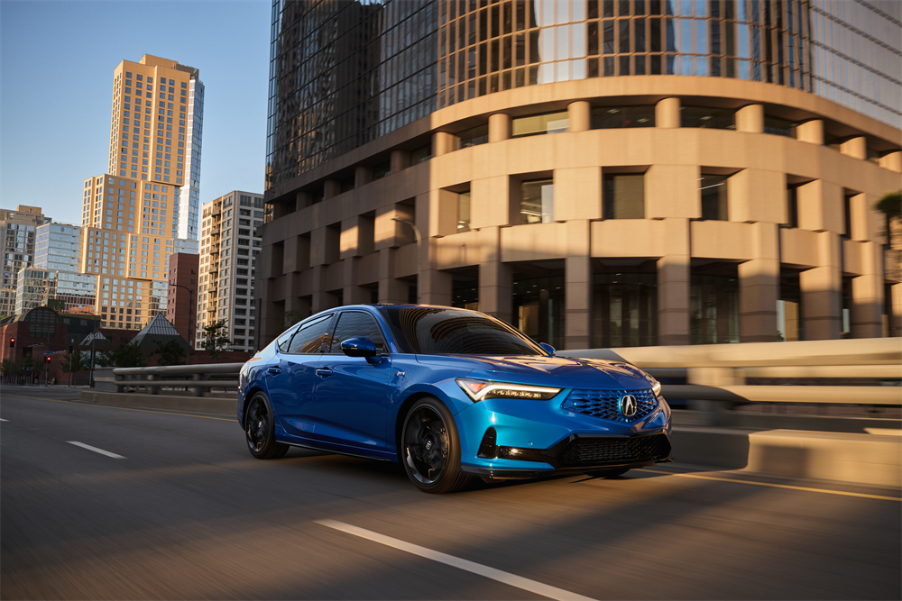 2026 Acura Integra driving in the city