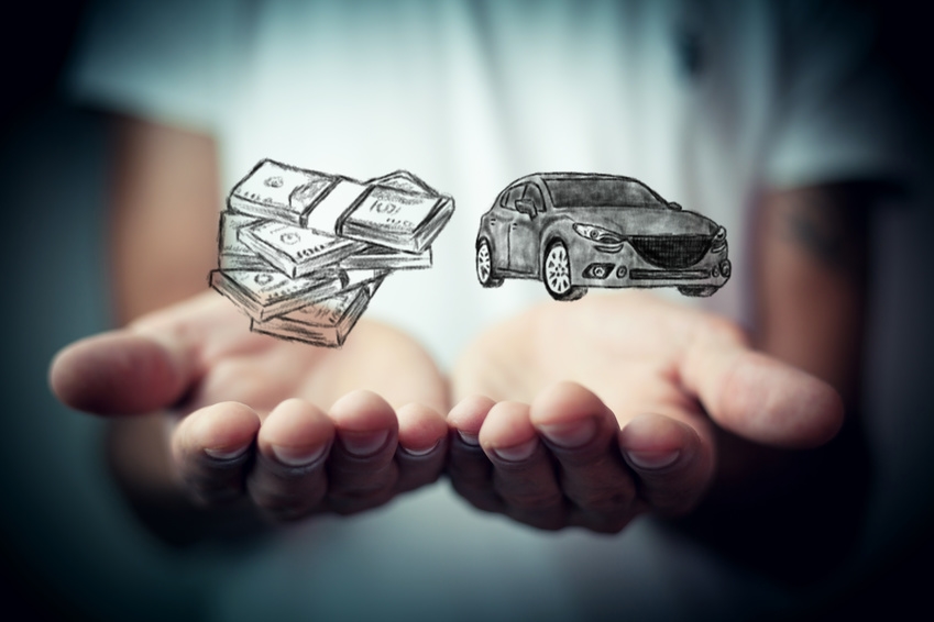 cash and car in hands stock image
