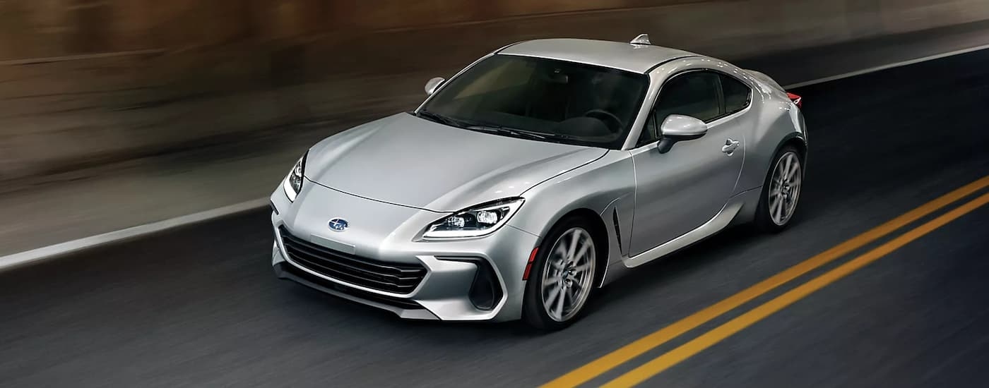 A silver 2023 Subaru BRZ Limited is shown from a high angle on the highway.