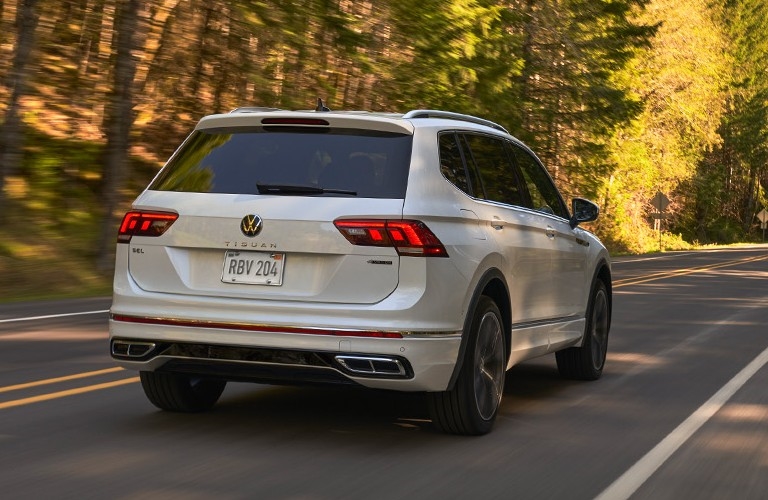 rear view of 2023 VW Tiguan driving on highway