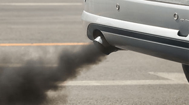 Why Are New Cars' Exhaust Pipes Often Stained Black?