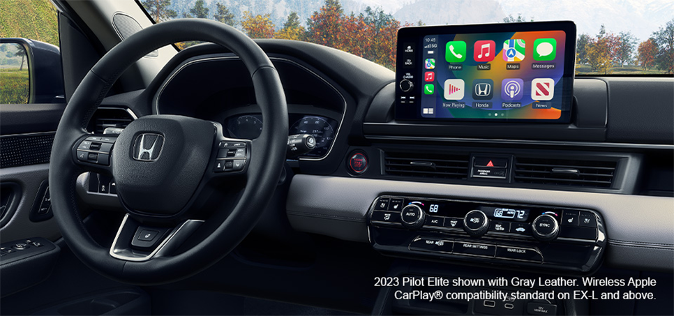 2023 Honda Pilot Elite close up interior with gray leather, Apple CarPlay