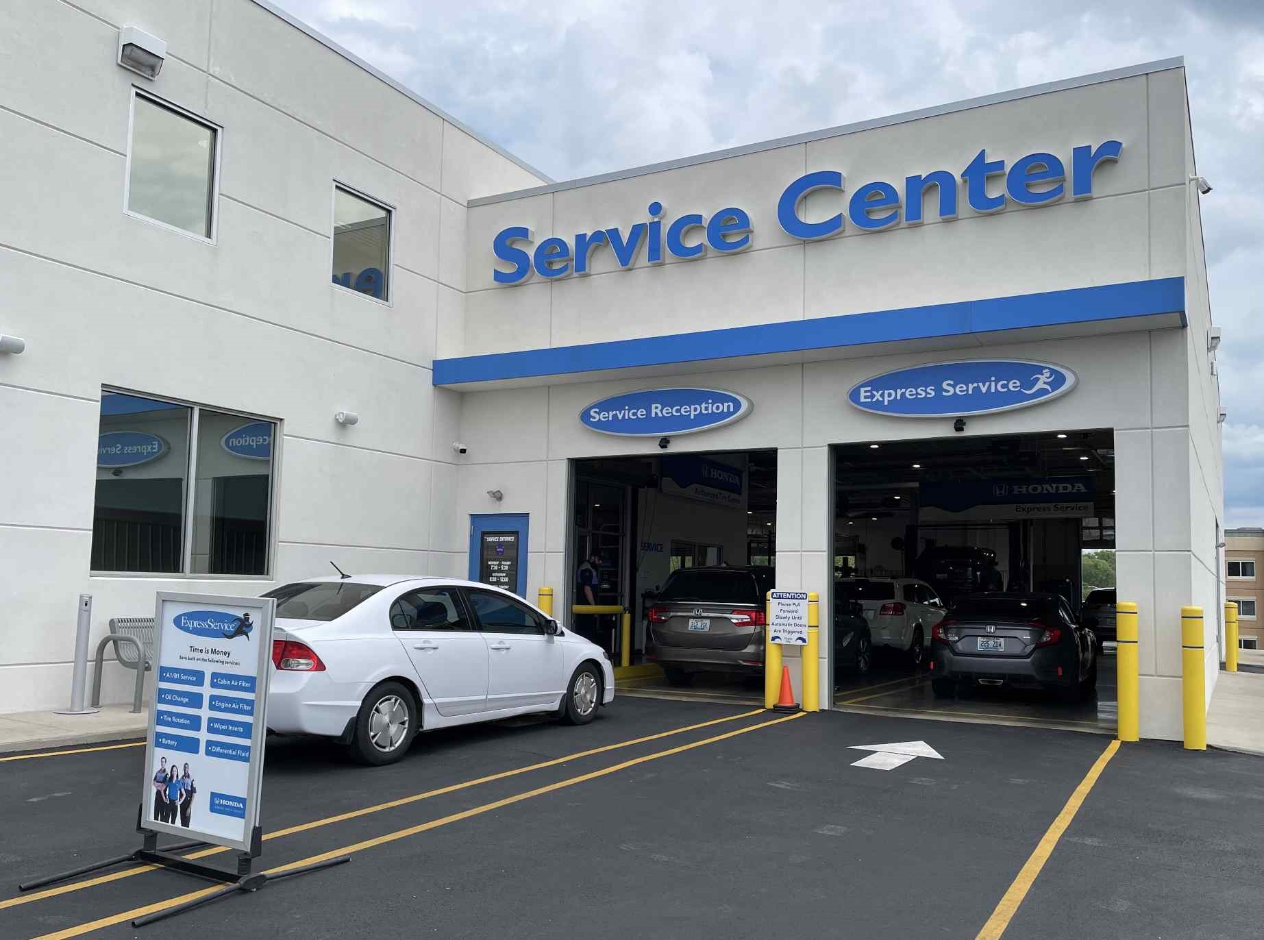 Honda shine service centre near online me