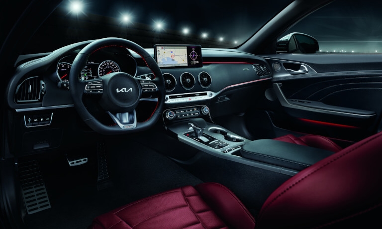 2023 Kia Forte front seats and dashboard at night