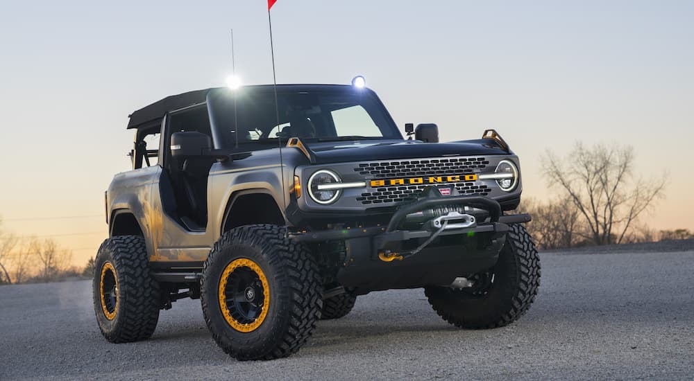 A grey 2022 Ford Bronco Badlands Sasquatch is shown parked on pavement.