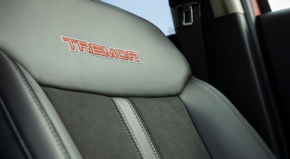 A close up shows the Tremor stitching on a seat in a 2021 Ford Ranger Tremor Lariat.