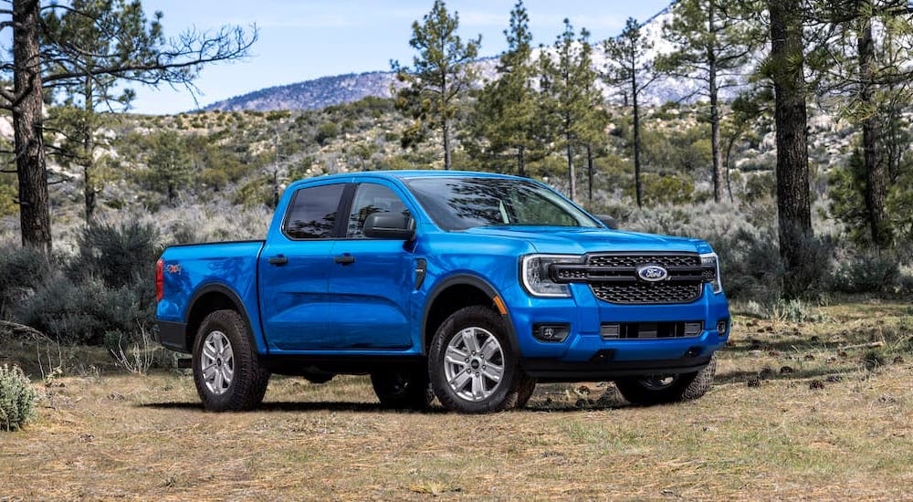 A blue 2024 Ford Ranger XL FX4 is shown from the front at an angle.