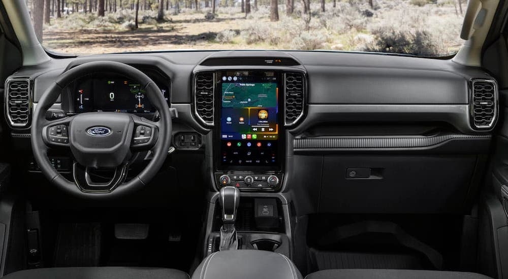 The black interior of a 2024 Ford Ranger is shown from above the center console.
