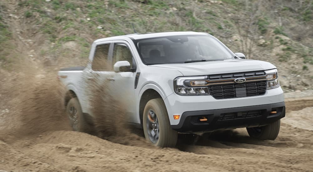 A grey 2024 Ford Maverick Tremor is shown from the front at an angle after leaving a dealer that hasFord trucks for sale near Poughkeepsie.