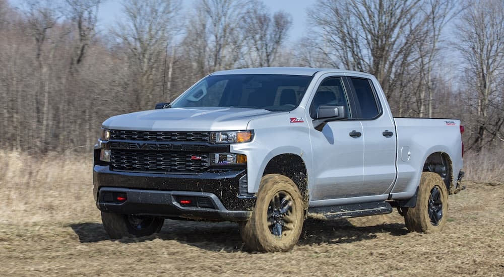 A grey 2020 Chevy Silverado 1500 Z71 Trail Boss is shown from the front at an angle.