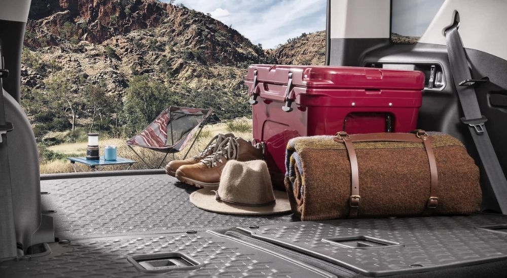 Camping gear is shown in the rear of a 2024 Ford Bronco Sport for sale.
