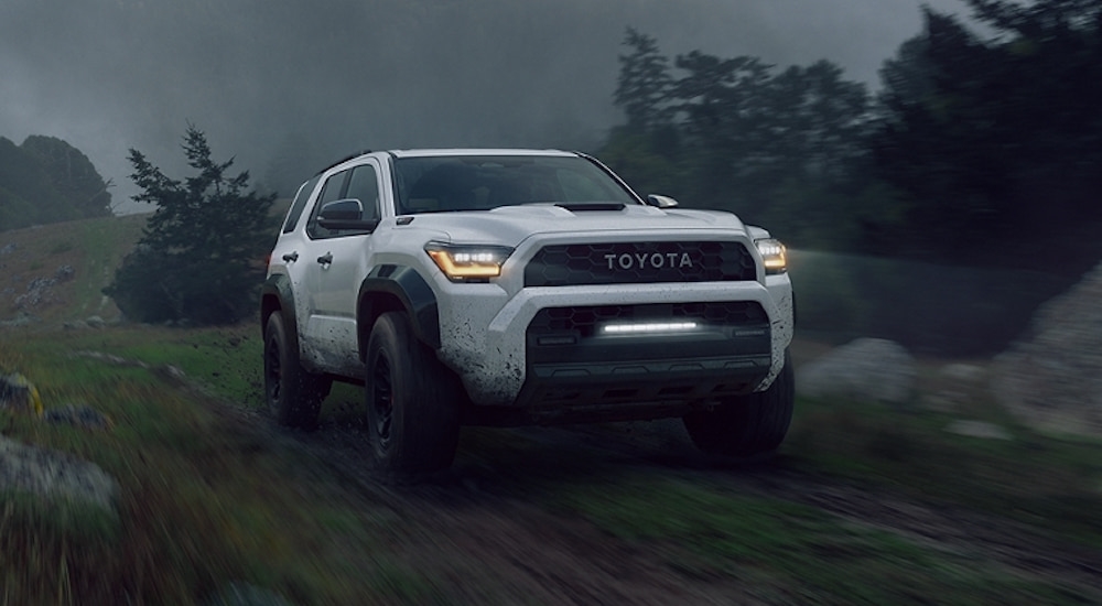 A white 2025 Toyota 4Runner TRD Pro is shown from the front at an angle.