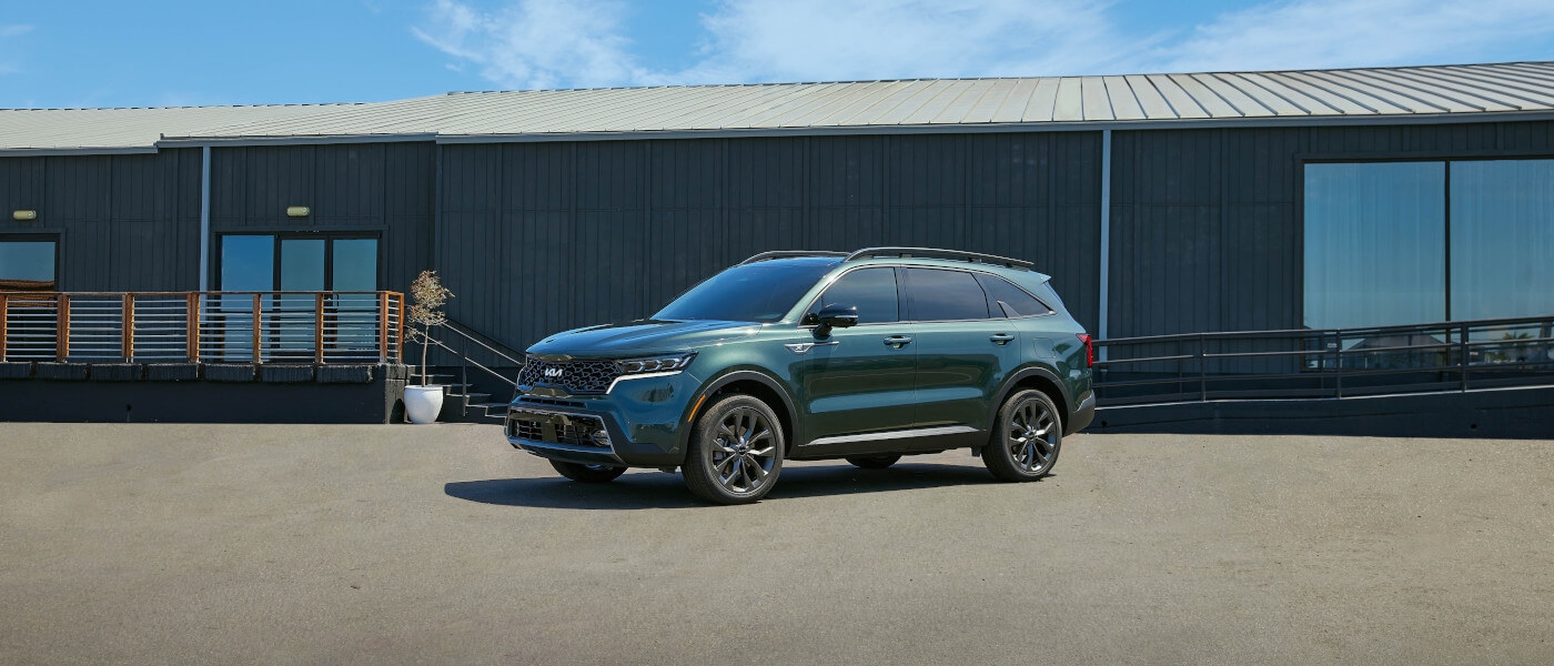 2024 Kia Sorento parked in front of a building