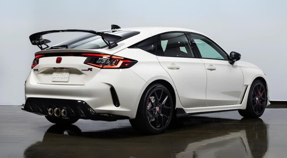 A white 2023 Honda Civic Type R parked is shown parked in a garage.