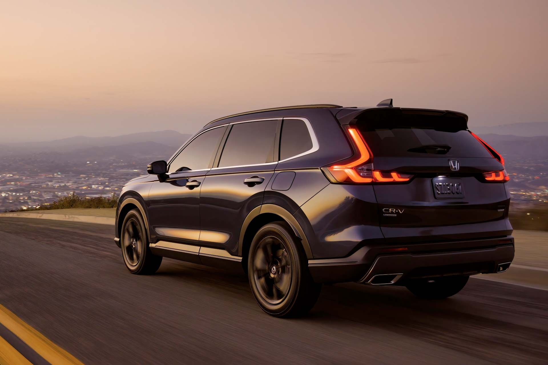 Honda CR-V Touring cruising southern California Highway.