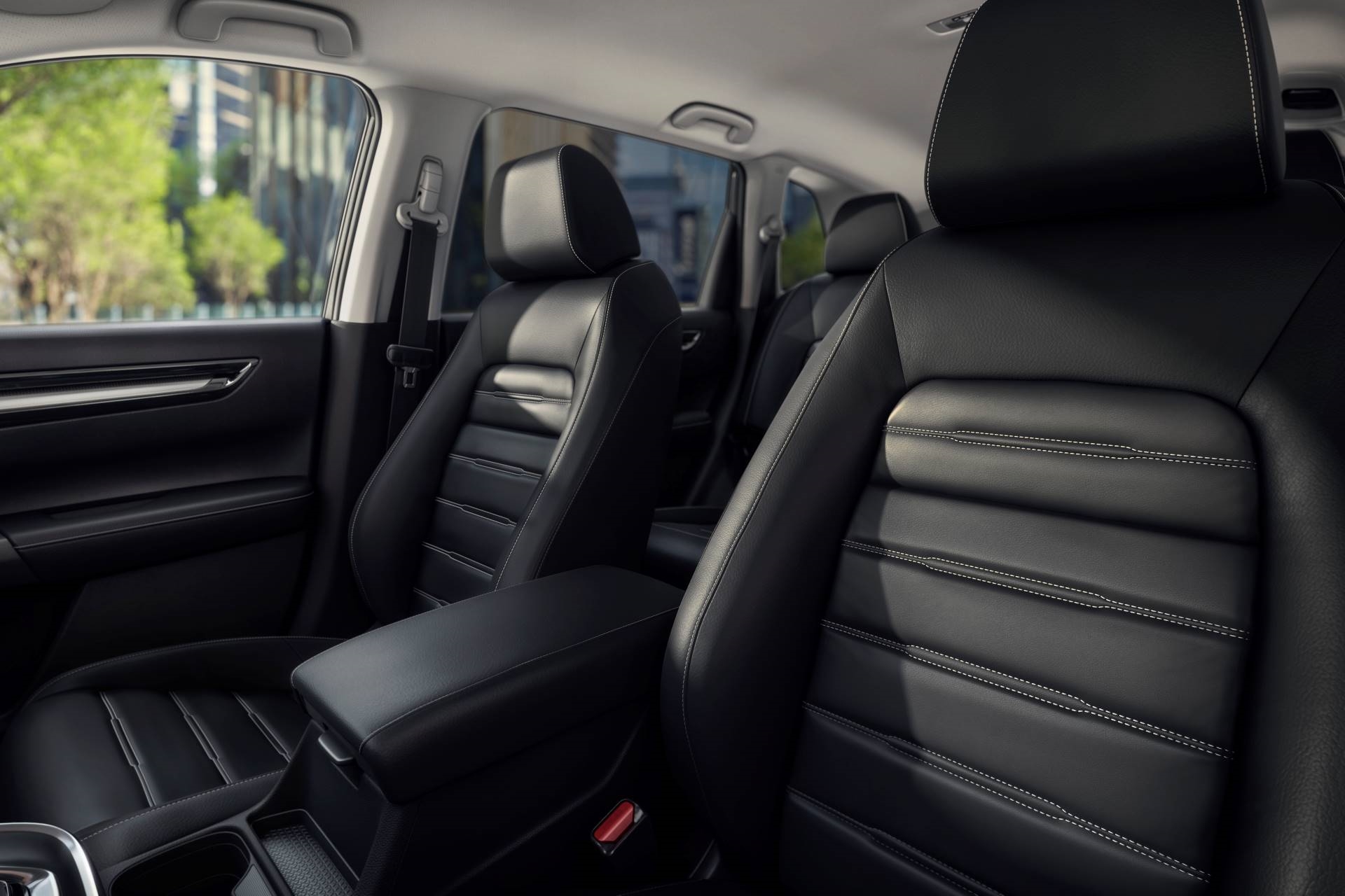 Next generation Honda CR-V sporting spotless seats and center console.