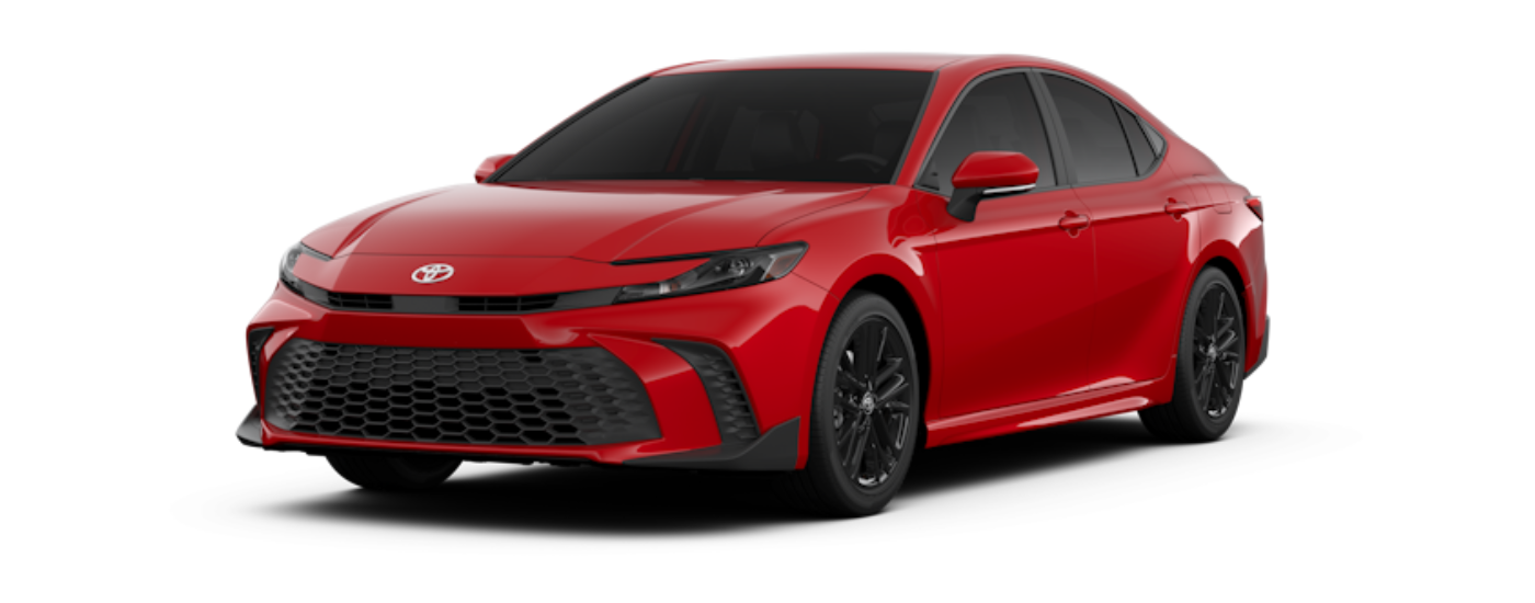 A red 2025 Toyota Camry SE angled left.