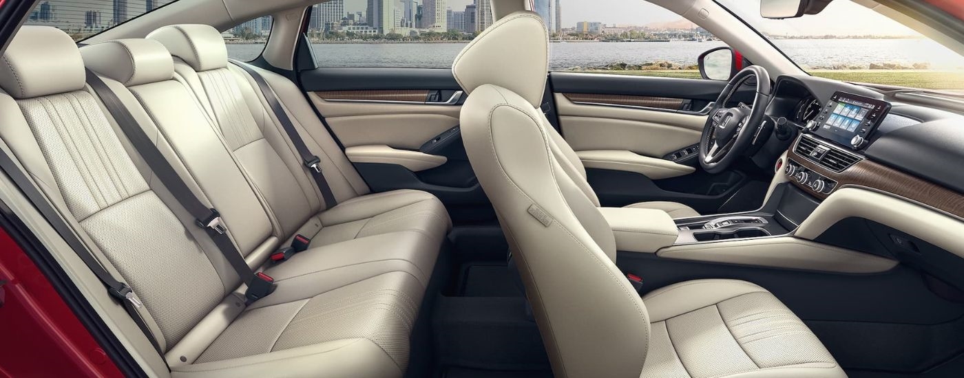 The leather seating is shown in a red 2021 Honda Accord.