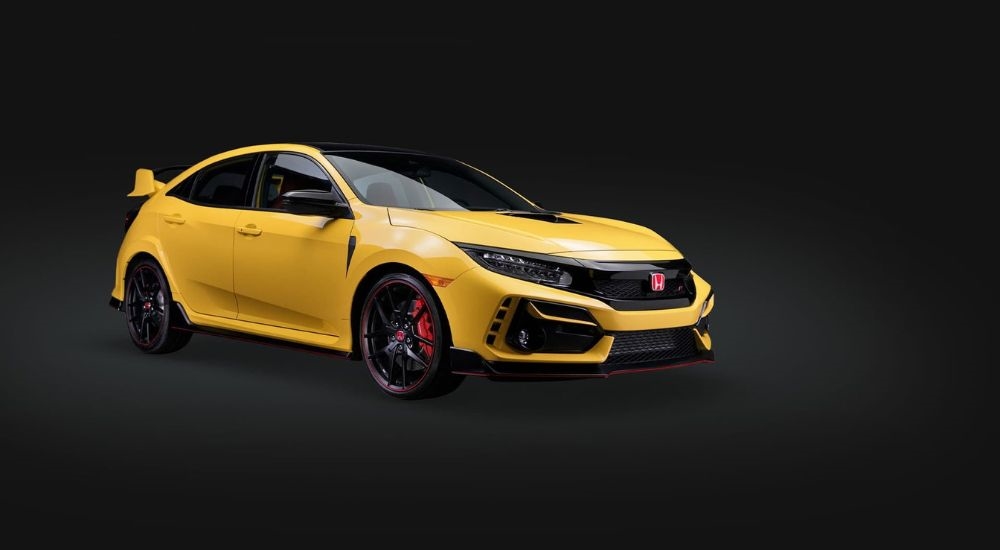 A yellow 2021 Honda Civic Type R Limited Edition is shown against a black background.