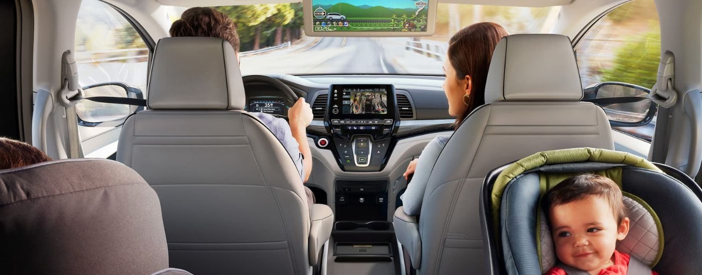 The gray and black interior and dash in a 2024 Honda Odyssey is shown.