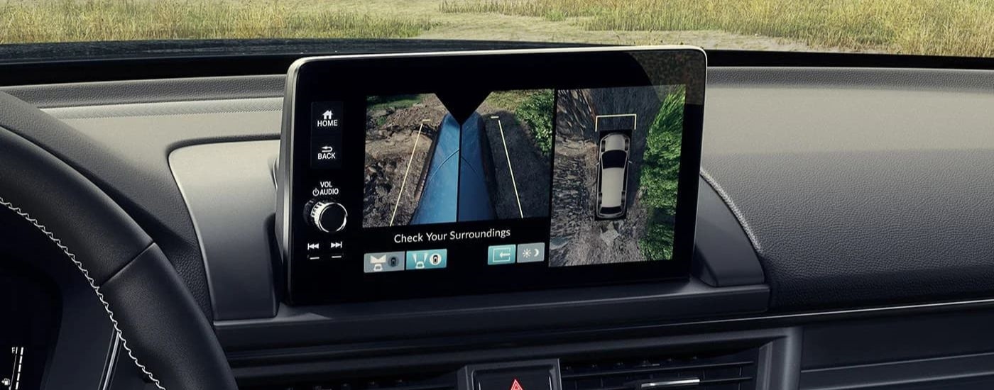 A close-up of the infotainment screen on the dash of a 2025 Honda Pilot is shown.