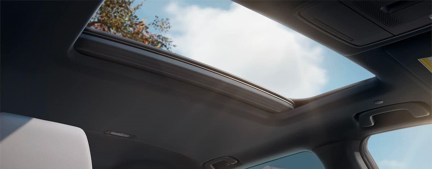 The moonroof is shown in a 2023 Honda CR-V Sport Touring.