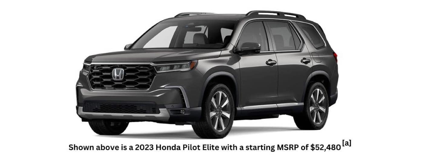 A grey 2023 Honda Pilot Elite is angled left.