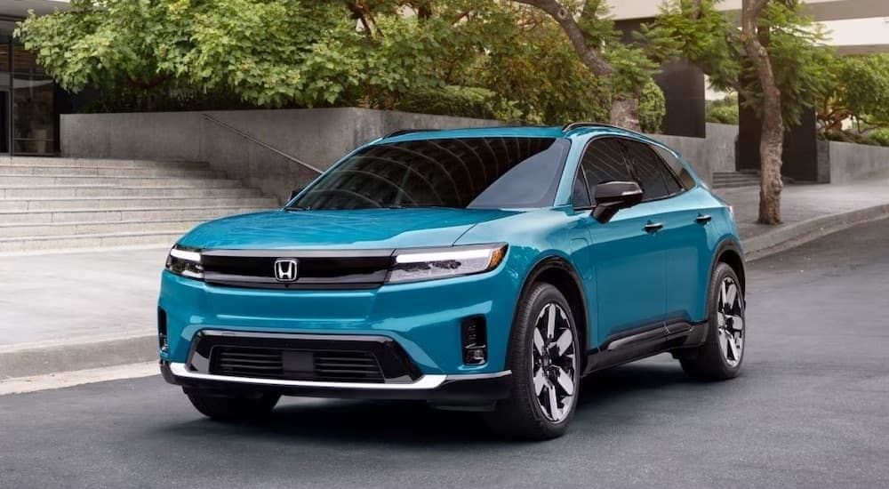 A teal 2024 Honda Prologue is shown from the front at an angle.