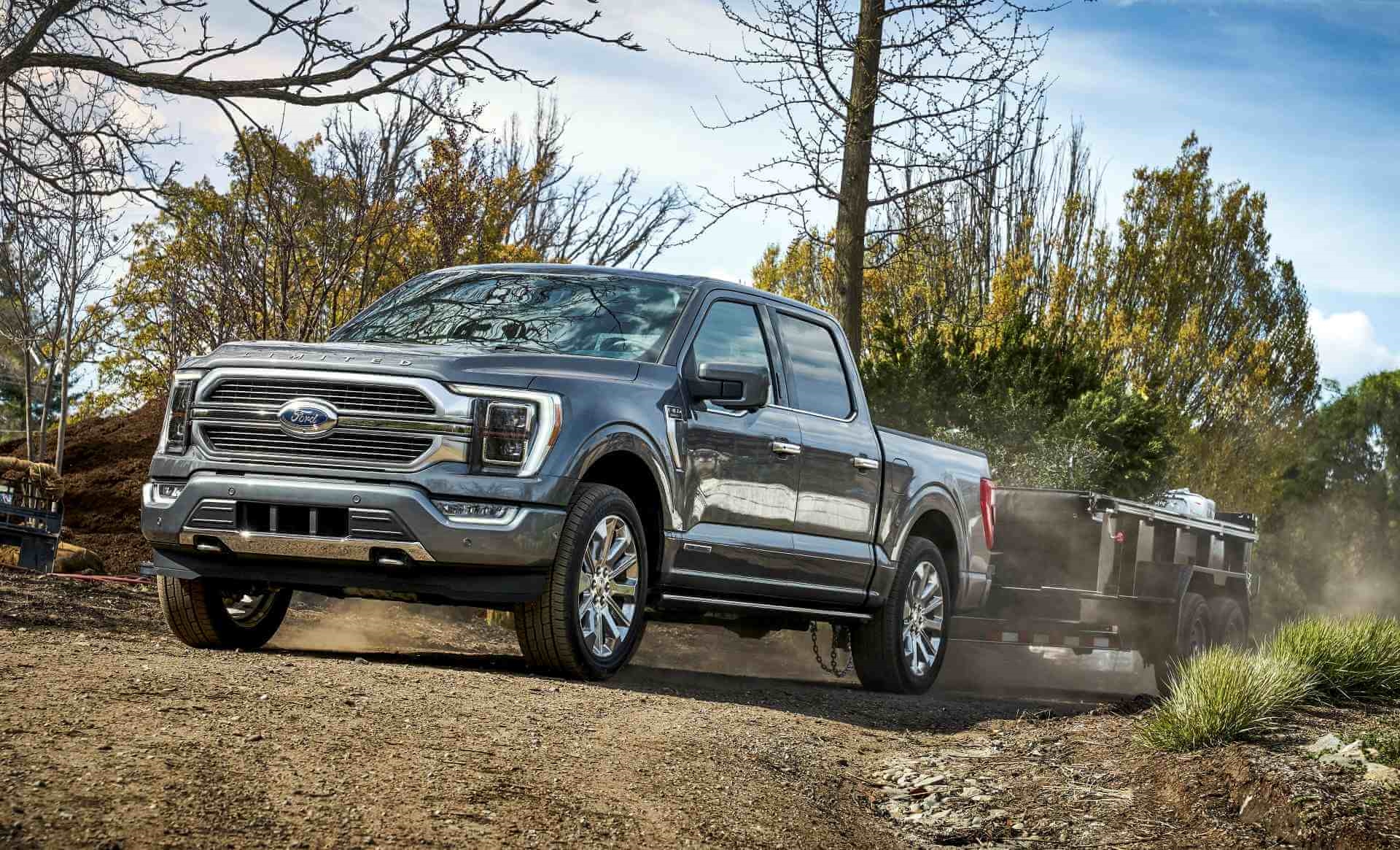 Ford F-150 towing trailer off road in So Cal.