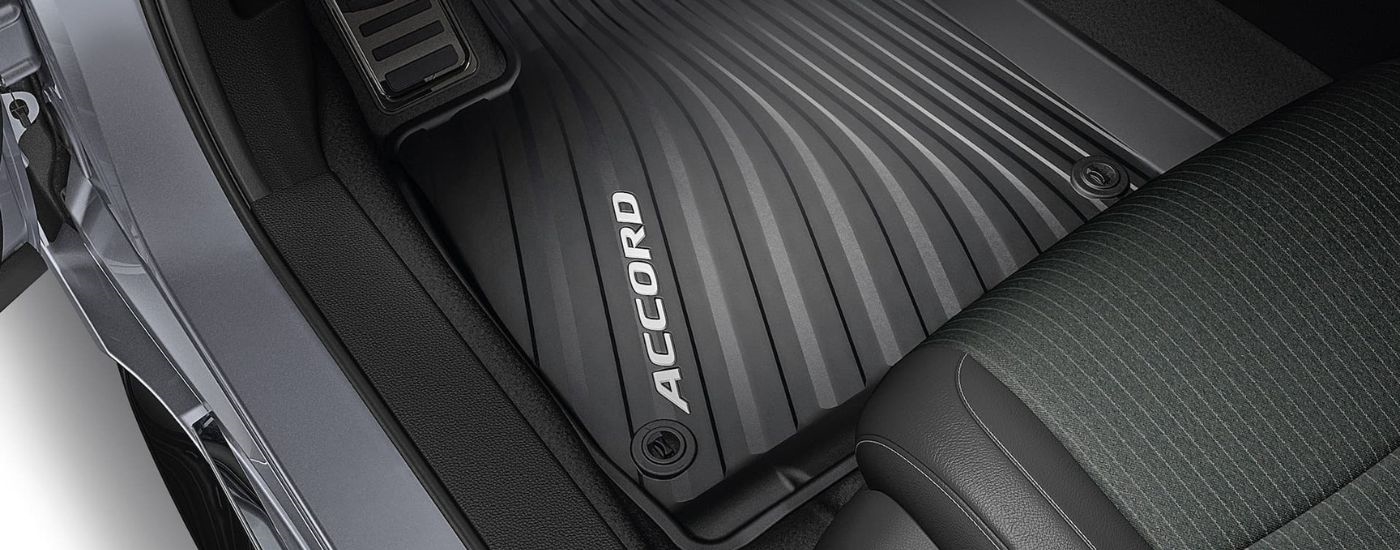 A close up shows a black all-weather floor mat in a 2021 Honda Accord.