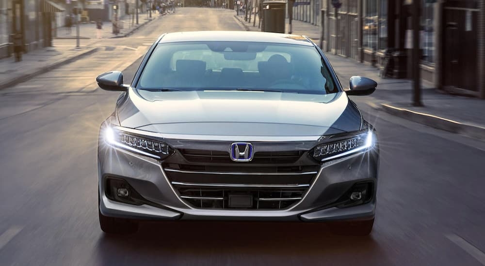 A grey 2021 Honda Accord is shown from the front.