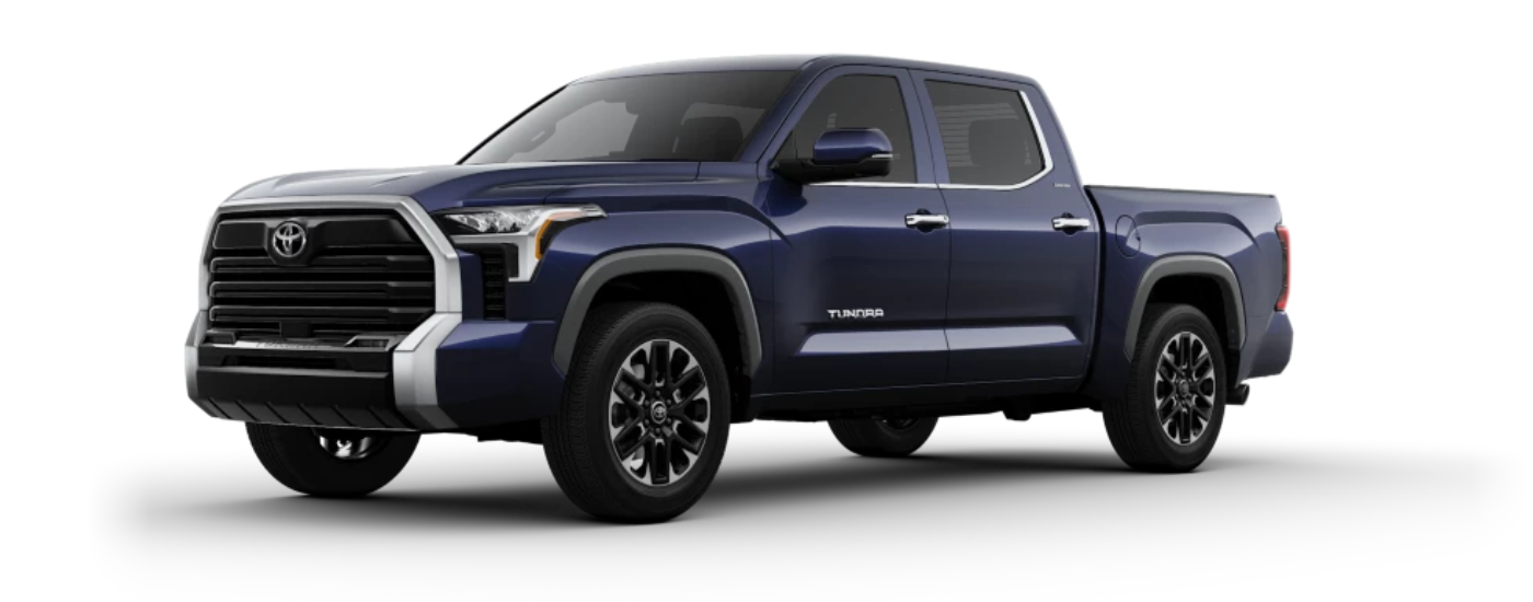 A blue 2024 Toyota Tundra Limited is angled left.