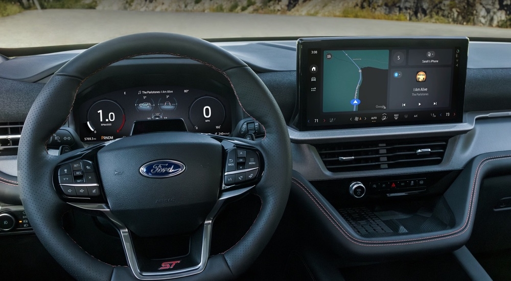 The steering wheel and infotainment screen in a 2025 Ford Explorer ST.