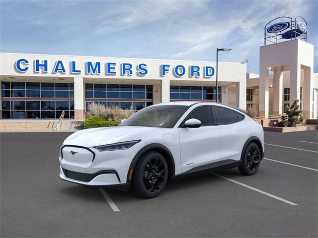 white 2024 ford mustang mach-e electric vehicle parked outside the Chalmers Ford dealership in Albuquerque, NM