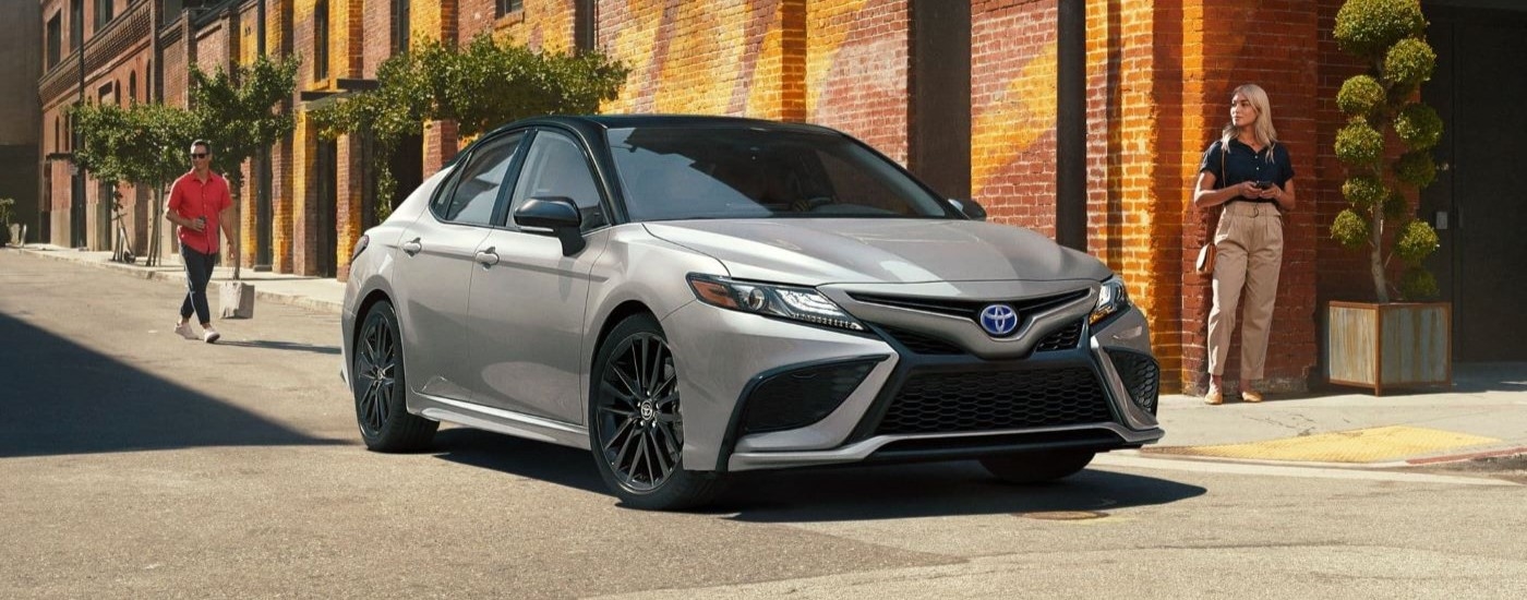 A silver 2022 Toyota Camry is shown from the front at an angle.