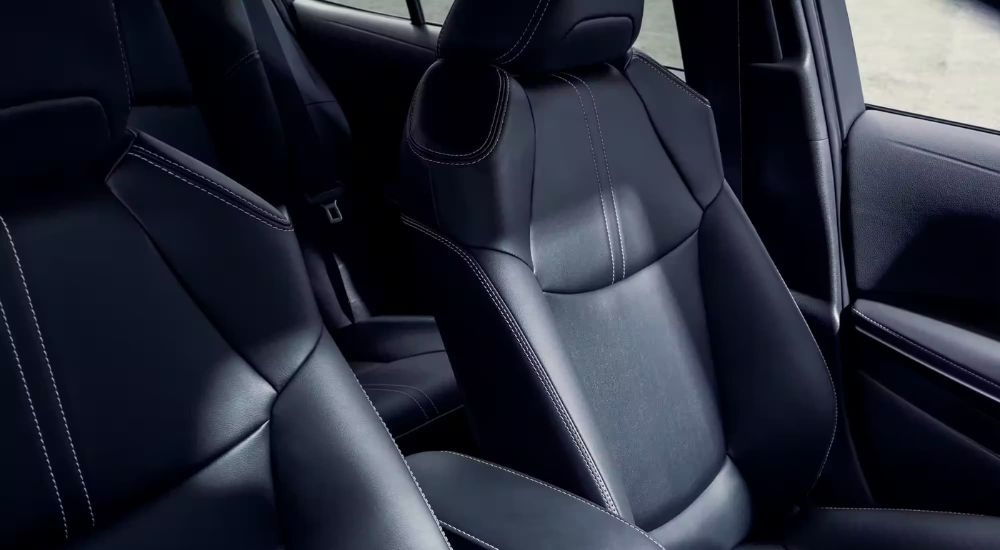 Black upholstery on the front seats in a 2024 Toyota Corolla Hybrid XLE.