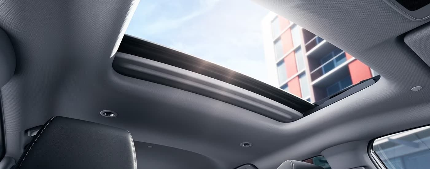 The open moonroof is shown in a 2025 Honda HR-V EX-L.