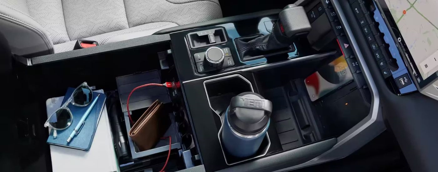 A close-up shows the center console in a 2023 Toyota Tundra Limited.