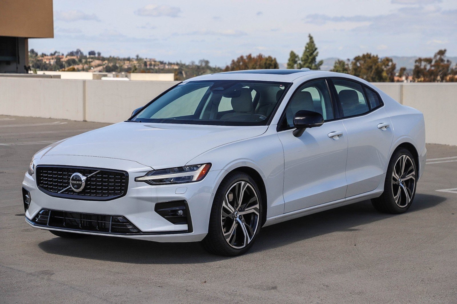 blue 2024 Volvo s60 sedan parked at the Volvo Cars Mission Viejo dealership in Mission Viejo, CA